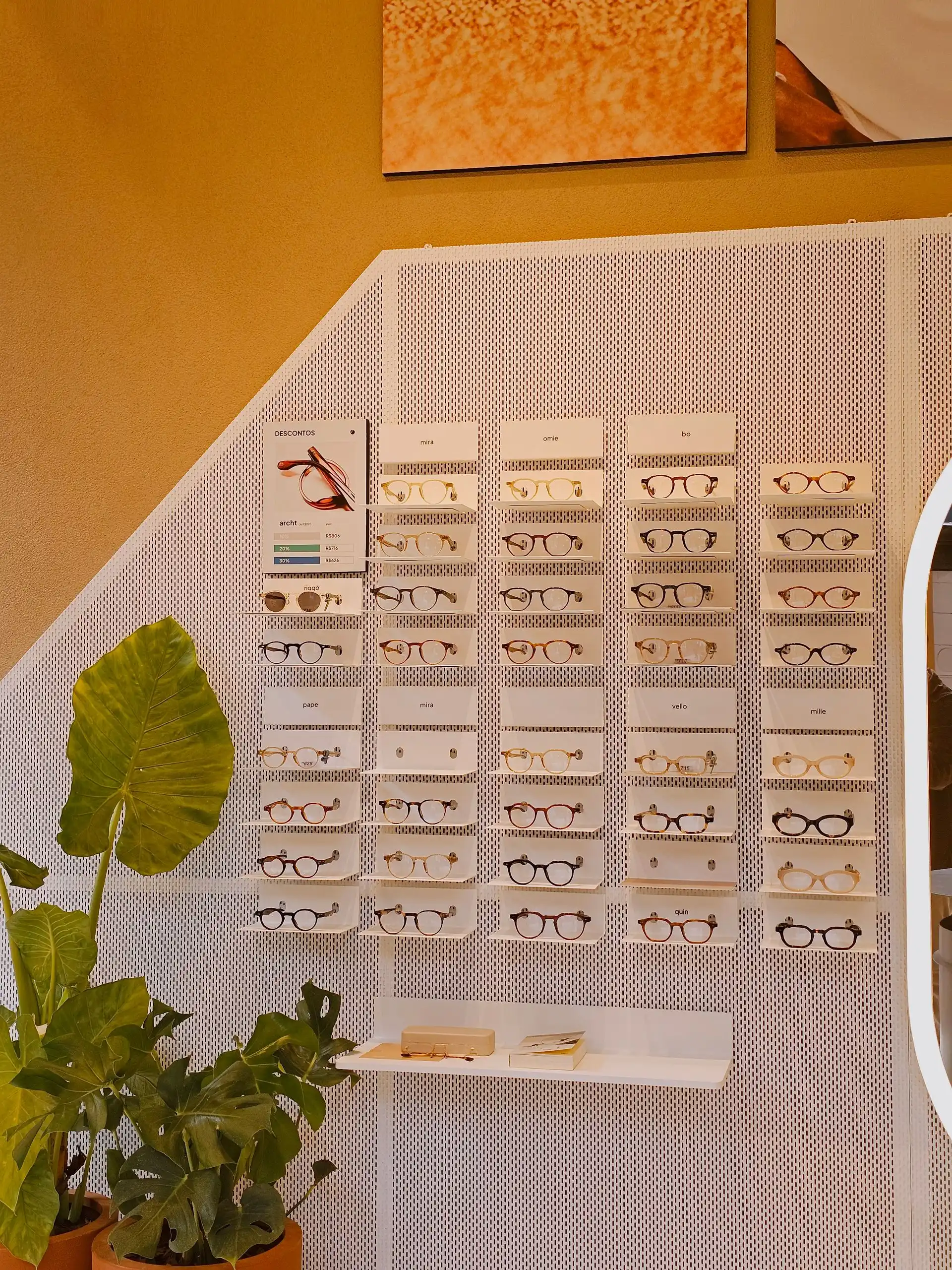 Display of stylish designer eyewear frames in store